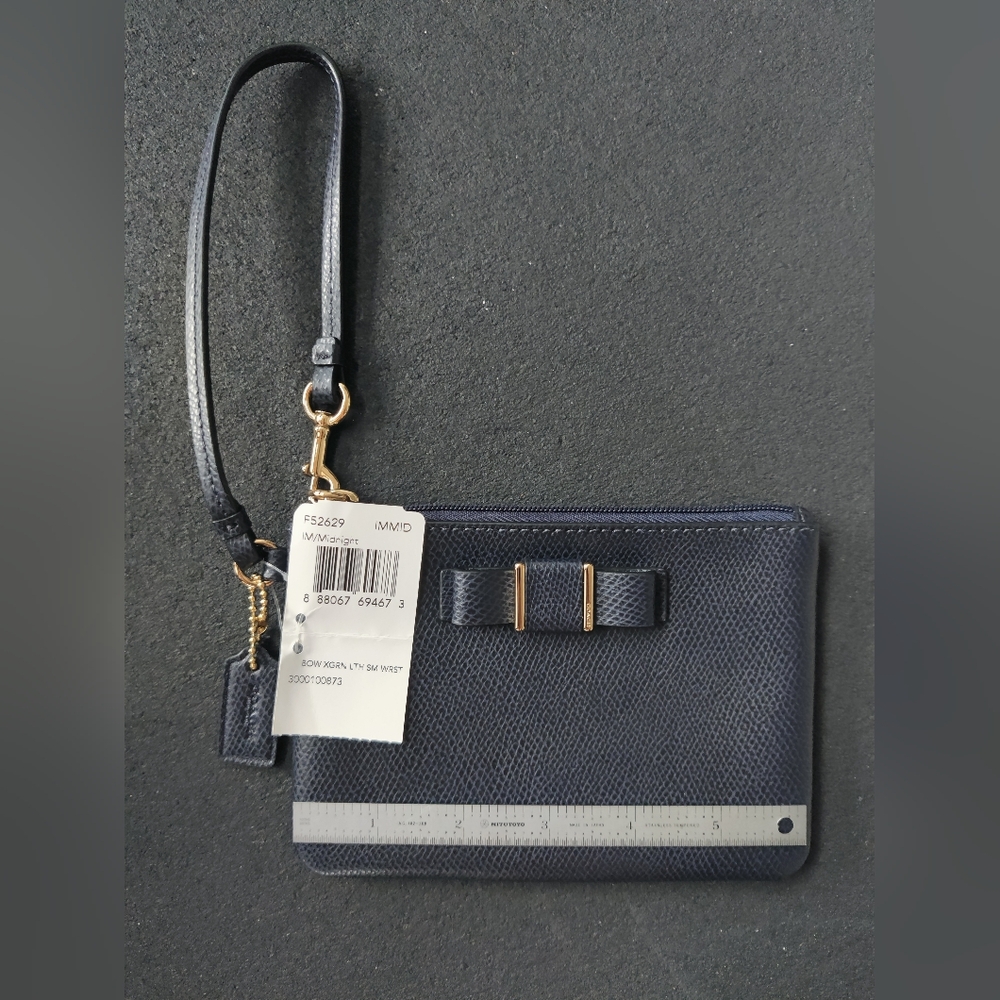 Coach Navy Wristlet with Bow Accent